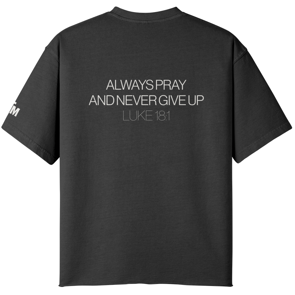 Black t-shirt with motivational quote on the back on a white background