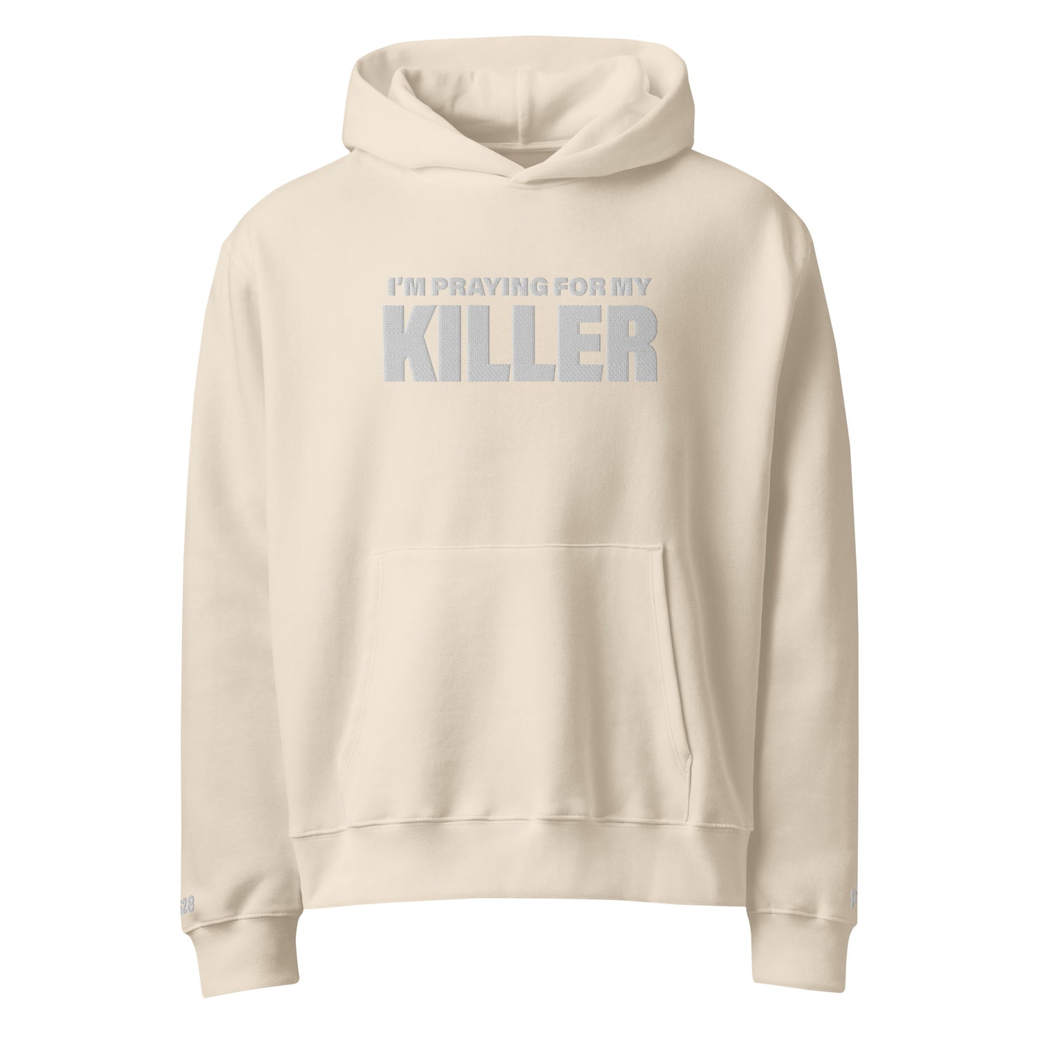 Beige hoodie with text 'I'm praying for my killer' on a white background
