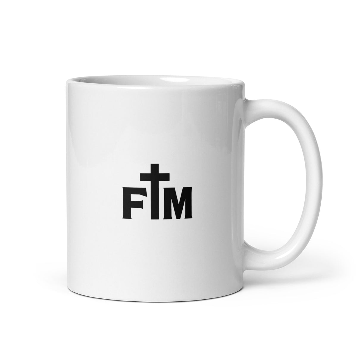 Small black Faith Mode logo on the bag of a white ceramic mug