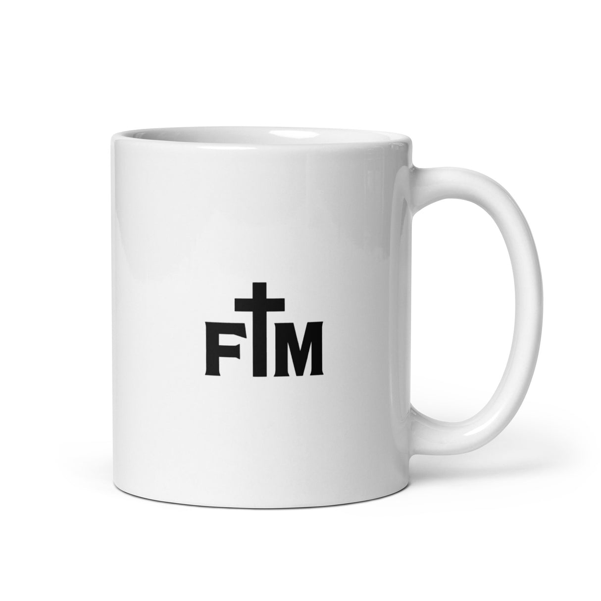 A Small Black Faith Mode Logo lies dead-center on the back of a white glossy ceramic coffee mug