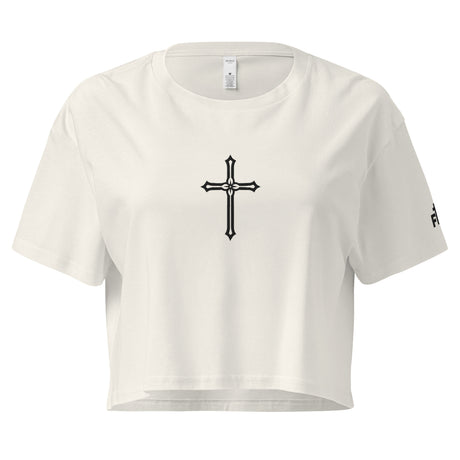 White crop top with a black cross design on a white background