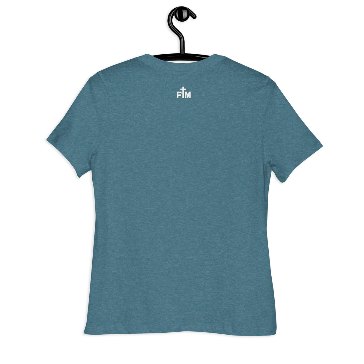 A heathered teal blue short-sleeve t-shirt hanging on a black hanger against a plain white background. The back of the shirt features a small white printed Faith Mode logo near the upper center containing the letters 'FM' and a small cross graphic between the letters.