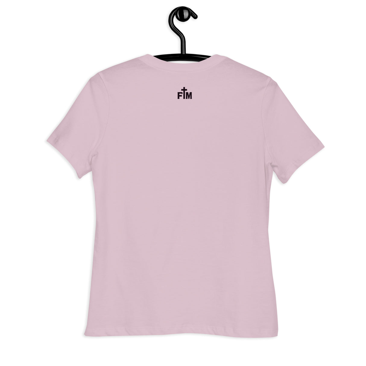 A light violet short-sleeve t-shirt hanging on a black hanger against a plain white background. The back of the shirt features a small Faith Mode "FM" print in dark plum text near the upper collar.
