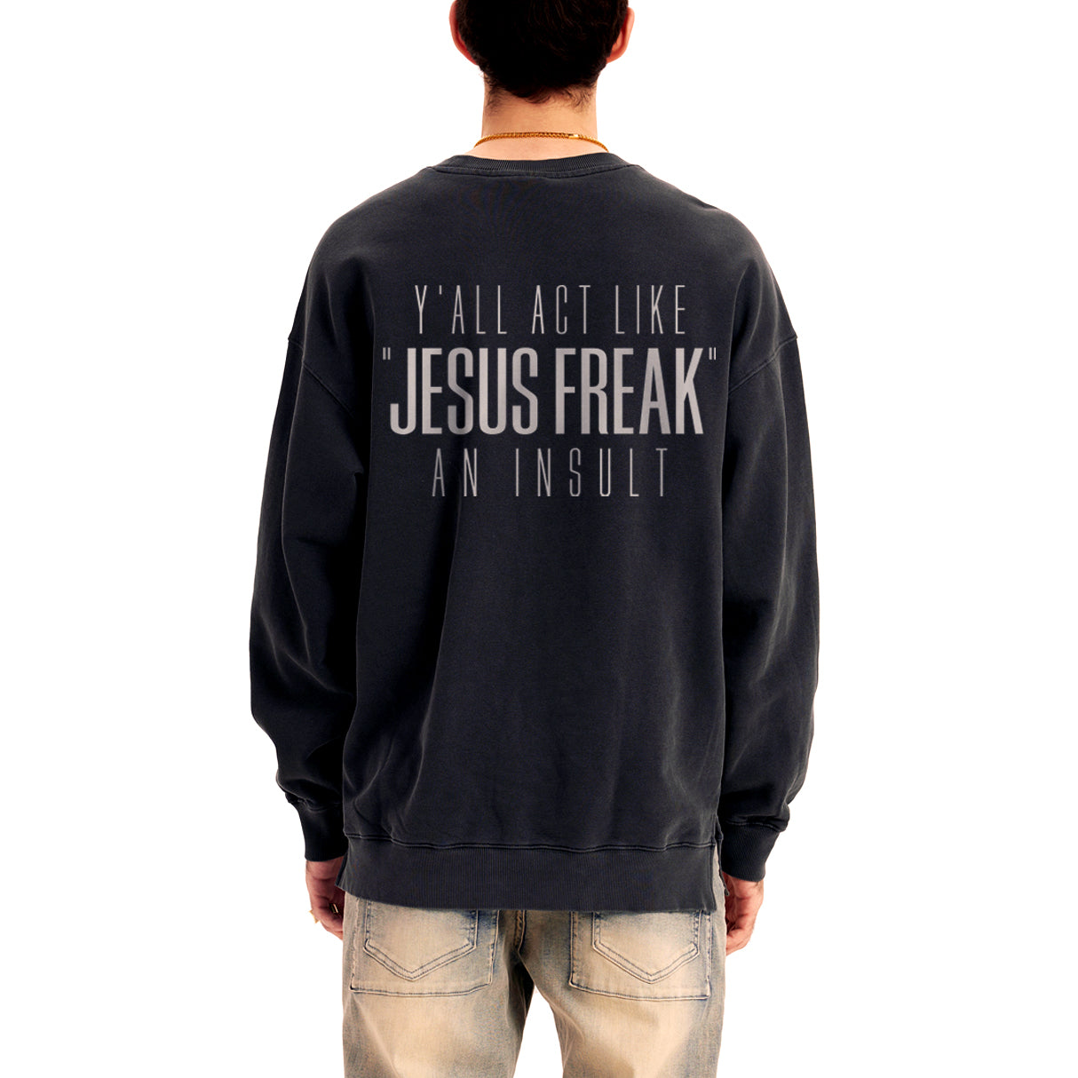 Black sweatshirt with text on the back worn by a person, white background