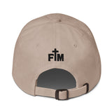 Beige cap with a black FM Faith Mode logo embroidered on the back against a white background
