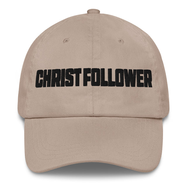 A beige baseball cap with the word 'CHRIST FOLLOWER' embroidered in bold black letters across the front, shown against a plain white background.