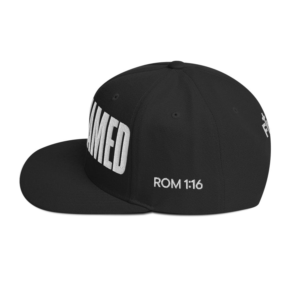 Black cap with 'ROM 1:16' text on a white background