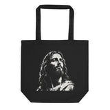 Black eco tote bag featuring a distressed cream-white artistic portrait of Jesus looking upward.
