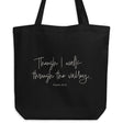 Black eco tote bag featuring “Though I Walk Through the Valley” and Psalm 23:4 in elegant cream-white script.