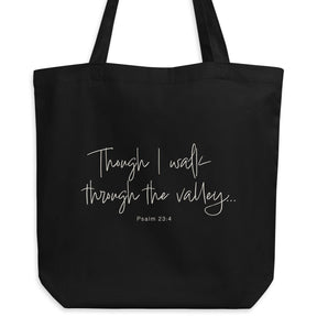 Black eco tote bag featuring “Though I Walk Through the Valley” and Psalm 23:4 in elegant cream-white script.