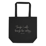 Black eco tote bag featuring “Though I Walk Through the Valley” and Psalm 23:4 in elegant cream-white script.