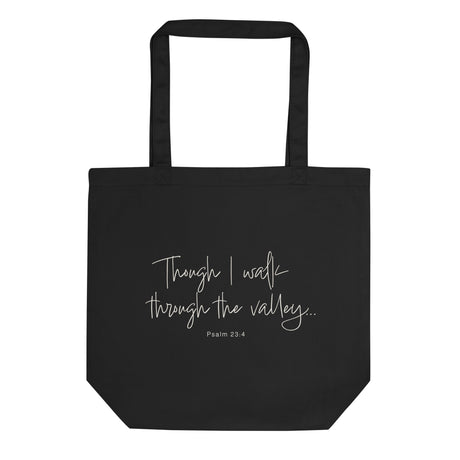 Black eco tote bag featuring “Though I Walk Through the Valley” and Psalm 23:4 in elegant cream-white script.