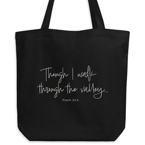 Black eco tote bag featuring “Though I Walk Through the Valley” and Psalm 23:4 in elegant cream-white script.