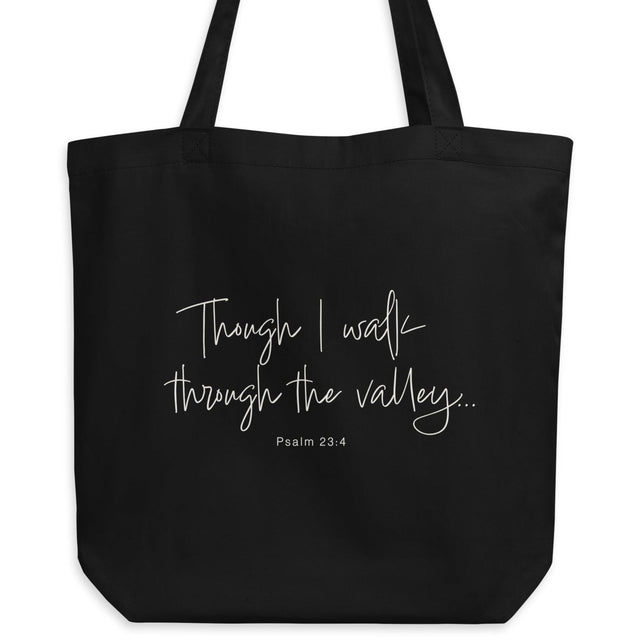 Black eco tote bag featuring “Though I Walk Through the Valley” and Psalm 23:4 in elegant cream-white script.