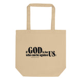 "If God is for us, who can be against us? Romans 8:31" in black lettering on a deep cream tote bag. 
