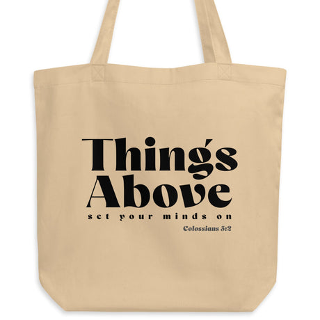 Natural oyster-colored eco tote bag featuring a black Things Above Colossians 3:2 typographic design.