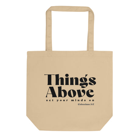 Natural oyster-colored eco tote bag featuring a black Things Above Colossians 3:2 typographic design.