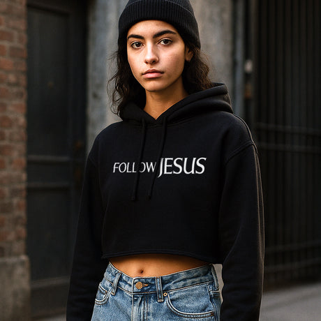 Woman wearing Faith Mode's Premium Follow Jesus Crop Hoodie