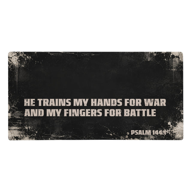 Large gaming mouse pad, black with cream distressing showing the scripture "He trains my hands for war and my fingers for battle, Psalm 144:1"