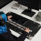 Large gaming mouse pad, black with cream distressing showing the scripture "He trains my hands for war and my fingers for battle, Psalm 144:1"