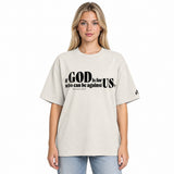 Front view of a faded bone oversized tee featuring black If God Is for Us Who Can Be Against Us lettering, Romans 8:31, and a small Faith Mode sleeve logo.