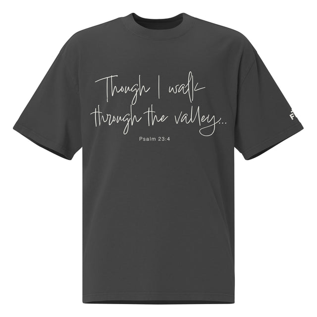 Front view of a Faded Black oversized tee featuring Though I Walk Through the Valley in cream script, Psalm 23:4, and a small Faith Mode sleeve logo.