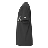 Side view of a Faded Black oversized tee featuring cream But First, Jesus lettering, Matthew 6:33, and a small Faith Mode logo on the left sleeve.