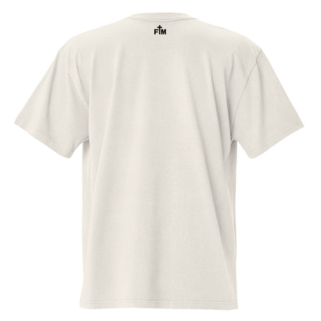 Small black "FM" Faith Mode logo printed on the upper back neck of a faded-bone oversized tee