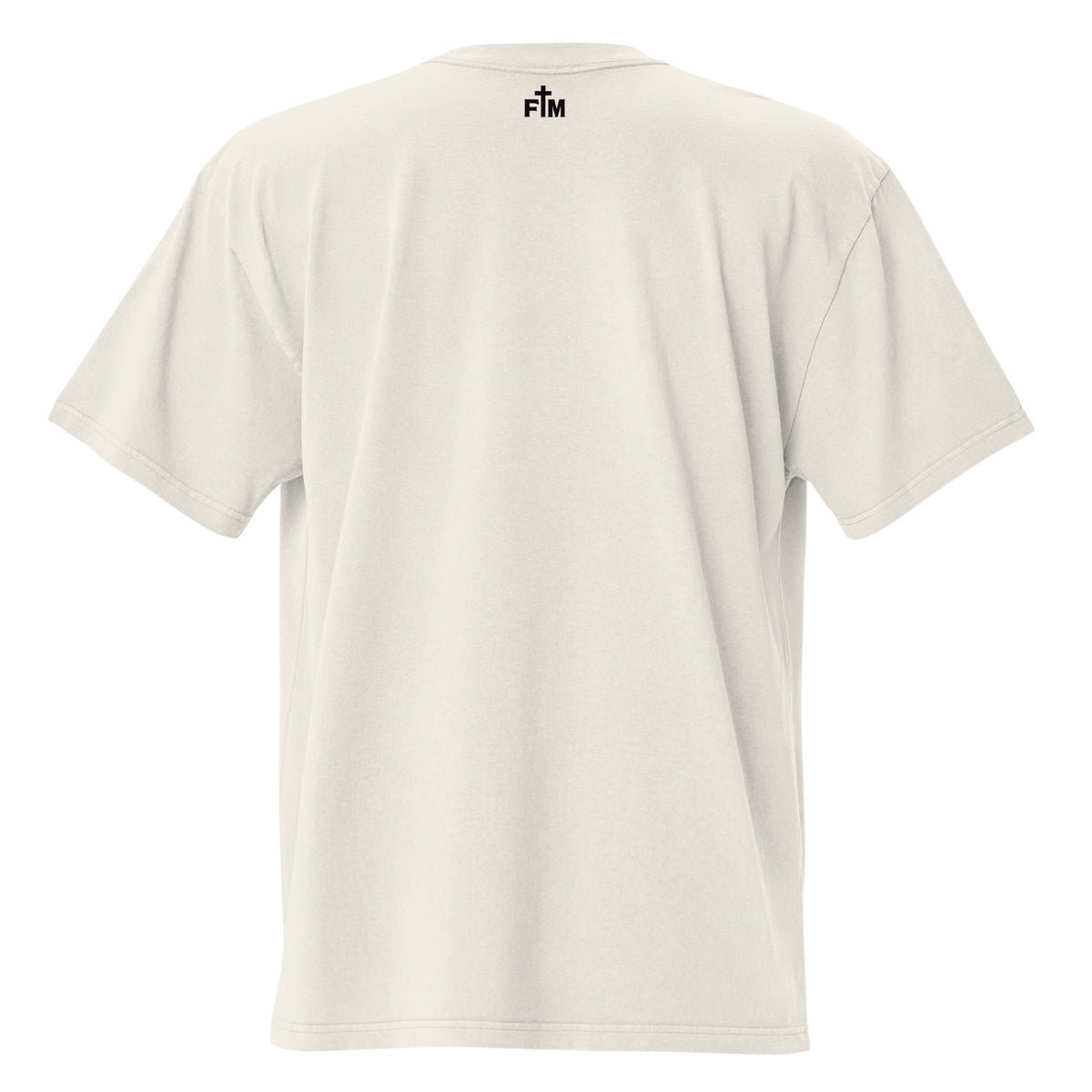 Small dark plum "FM" Faith Mode logo printed on the upper back neck of a faded-bone oversized tee