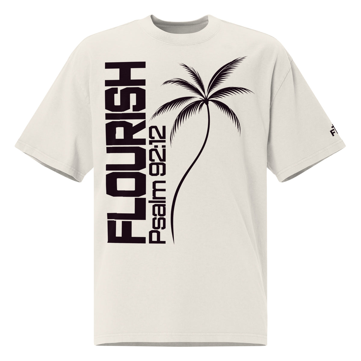 Front view of a faded bone oversized tee with dark plum vertical FLOURISH and Psalm 92:12 lettering, a palm tree graphic across the front, and a small logo on the sleeve.