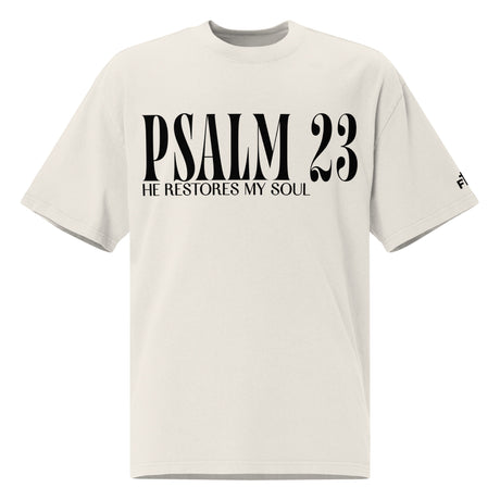 Front view of a faded bone oversized tee featuring black PSALM 23 lettering with He Restores My Soul underneath and a small Faith Mode logo on the sleeve.