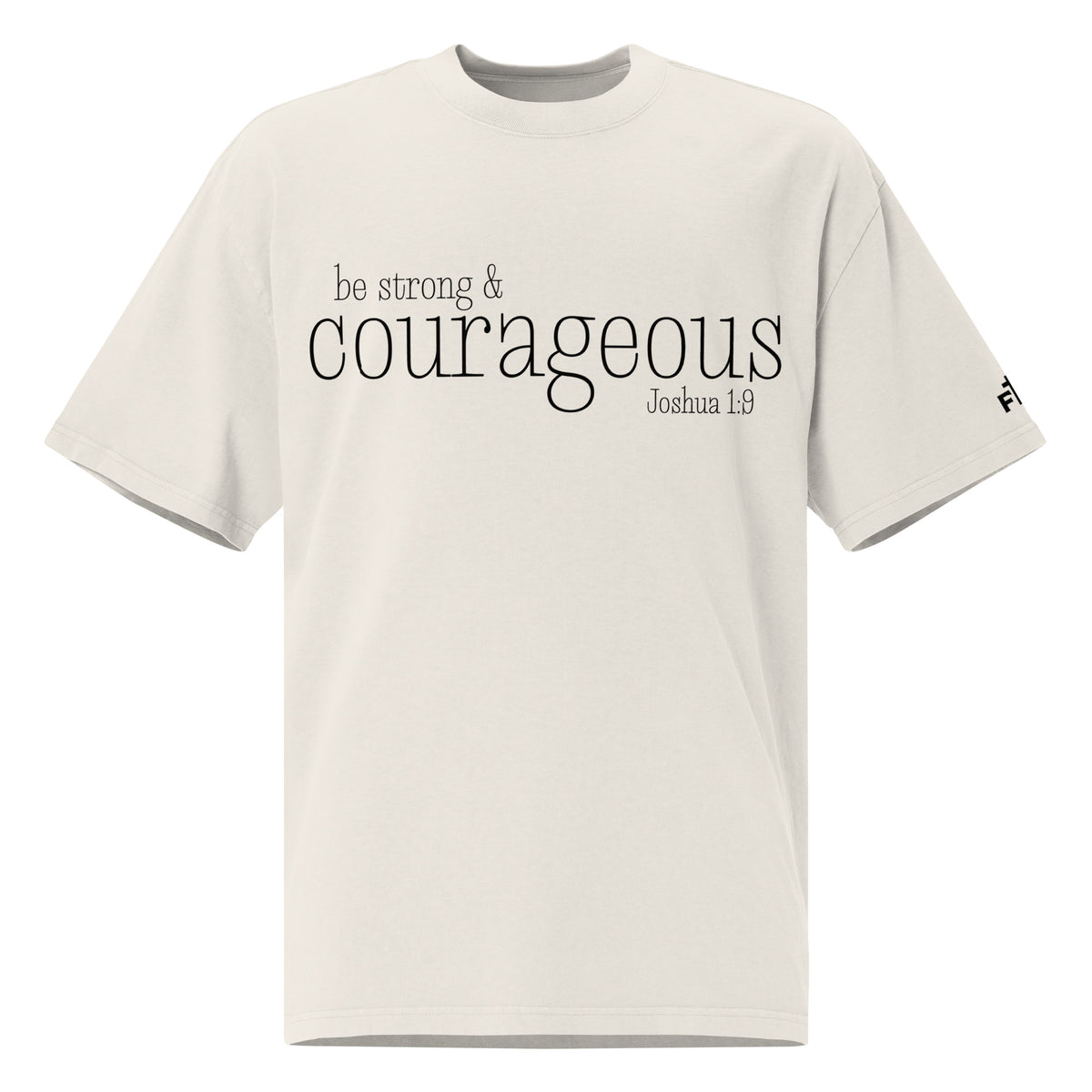Front view of a faded bone oversized tee featuring black Be Strong & Courageous lettering, Joshua 1:9, and a small Faith Mode logo on the left sleeve.