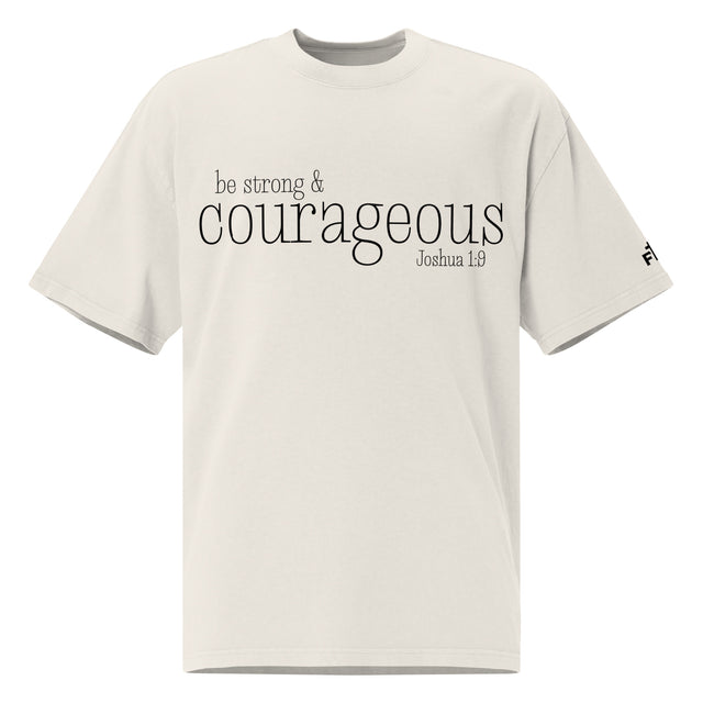 Front view of a faded bone oversized tee featuring black Be Strong & Courageous lettering, Joshua 1:9, and a small Faith Mode logo on the left sleeve.