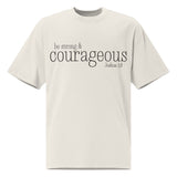 Front view of a faded bone oversized tee featuring black Be Strong & Courageous lettering, Joshua 1:9