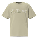 Front view of a Faded Eucalyptus oversized tee featuring cream All Things lettering, Philippians 4:13 beneath it, and a small Faith Mode logo on the left sleeve.