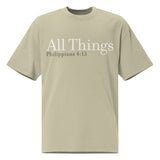 Front view of a Faded Eucalyptus oversized tee featuring cream All Things lettering, Philippians 4:13 beneath it