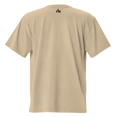 Small black "FM" Faith Mode logo printed on the upper back neck of a faded-khaki oversized tee