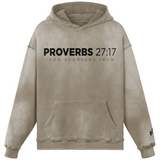 Beige hoodie with 'Proverbs 27:17' text on a white background