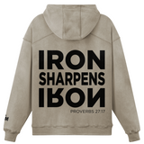 Beige hoodie with 'IRON SHARPENS IRON' text on the back against a white background