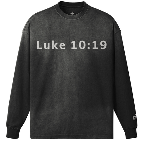 Black long-sleeve shirt with 'Luke 10:19' printed on a white background