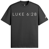 Black t-shirt with 'LUKE 6:28' printed on a white background
