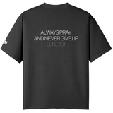 Black t-shirt with motivational quote on the back on a white background