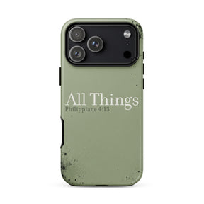 An olive green phone case with a distressed, weathered texture and black speckles, featuring the text 'All Things Philippians 4:13' in white. The case is shown on a plain white background.