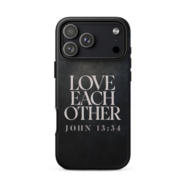 A black protective phone case featuring the text 'LOVE EACH OTHER JOHN 13:34' in a distressed white serif font, shown on a plain white background.