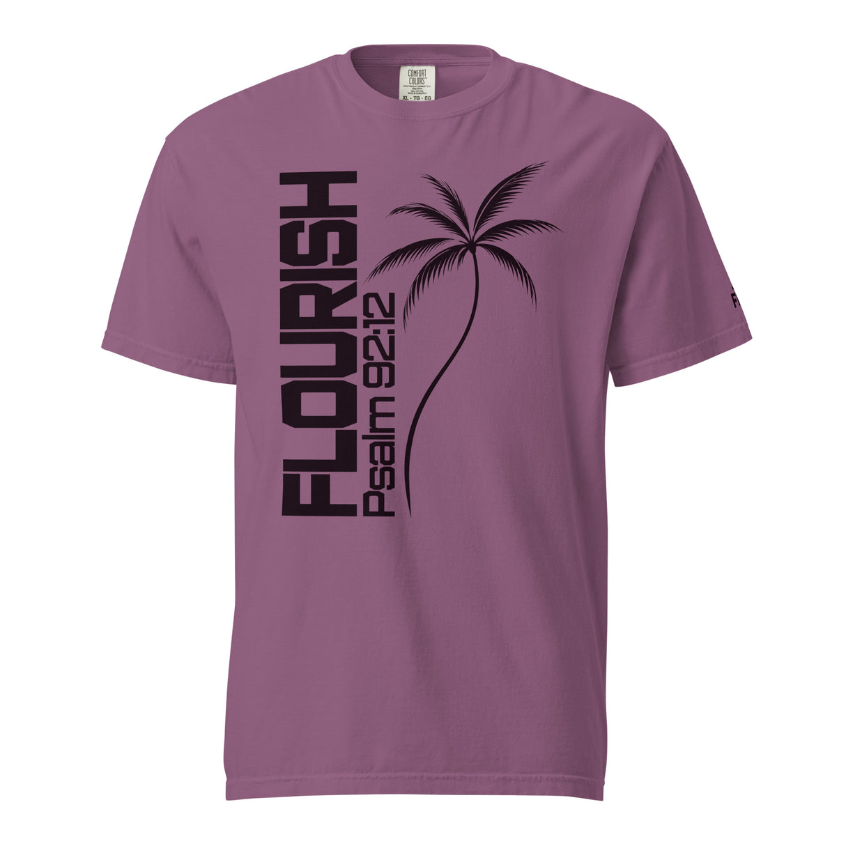 A mauve purple short-sleeve t-shirt with a black graphic print featuring the word 'FLOURISH' vertically, a palm tree, and 'PSALM 92:12' on the front, displayed on a solid white background.