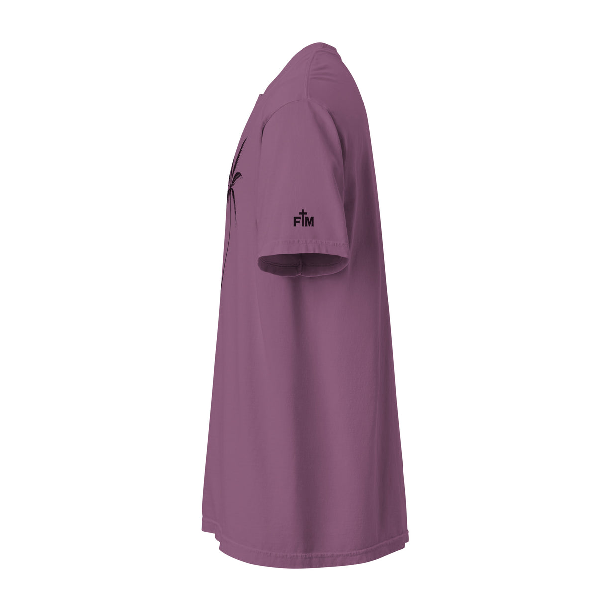 A short-sleeve t-shirt in a dusty mauve or purple color, shown from a side profile view on a solid white background. A small dark purple logo with the letters 'FM' is printed on the left sleeve. Faith Mode.