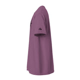 A short-sleeve t-shirt in a dusty mauve or purple color, shown from a side profile view on a solid white background. A small dark purple logo with the letters 'FM' is printed on the left sleeve. Faith Mode.