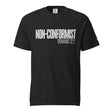 A black short-sleeve crewneck t-shirt with 'NON-CONFORMIST ROMANS 12:2' printed in white text across the chest, shown on a plain white background.