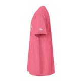 A pink short-sleeve athletic t-shirt shown from a side profile view against a solid white background. The shirt features a white printed logo on the upper left chest and a small white 'FM' logo on the right sleeve.