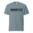 A slate blue short-sleeve t-shirt with 'ROMANS 13:12' and 'ARMOR OF LIGHT' printed in black across the chest, displayed on a clean white background.